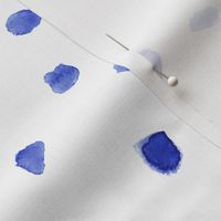 Saturated royal blue watercolor dots