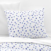 Saturated royal blue watercolor dots