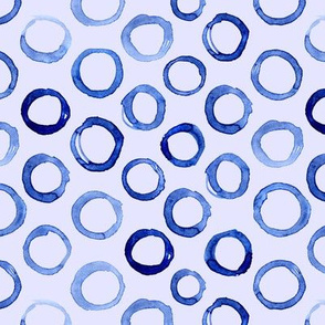 Watercolor circles on blue