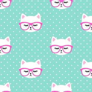 cat with hot pink glasses on polka dots