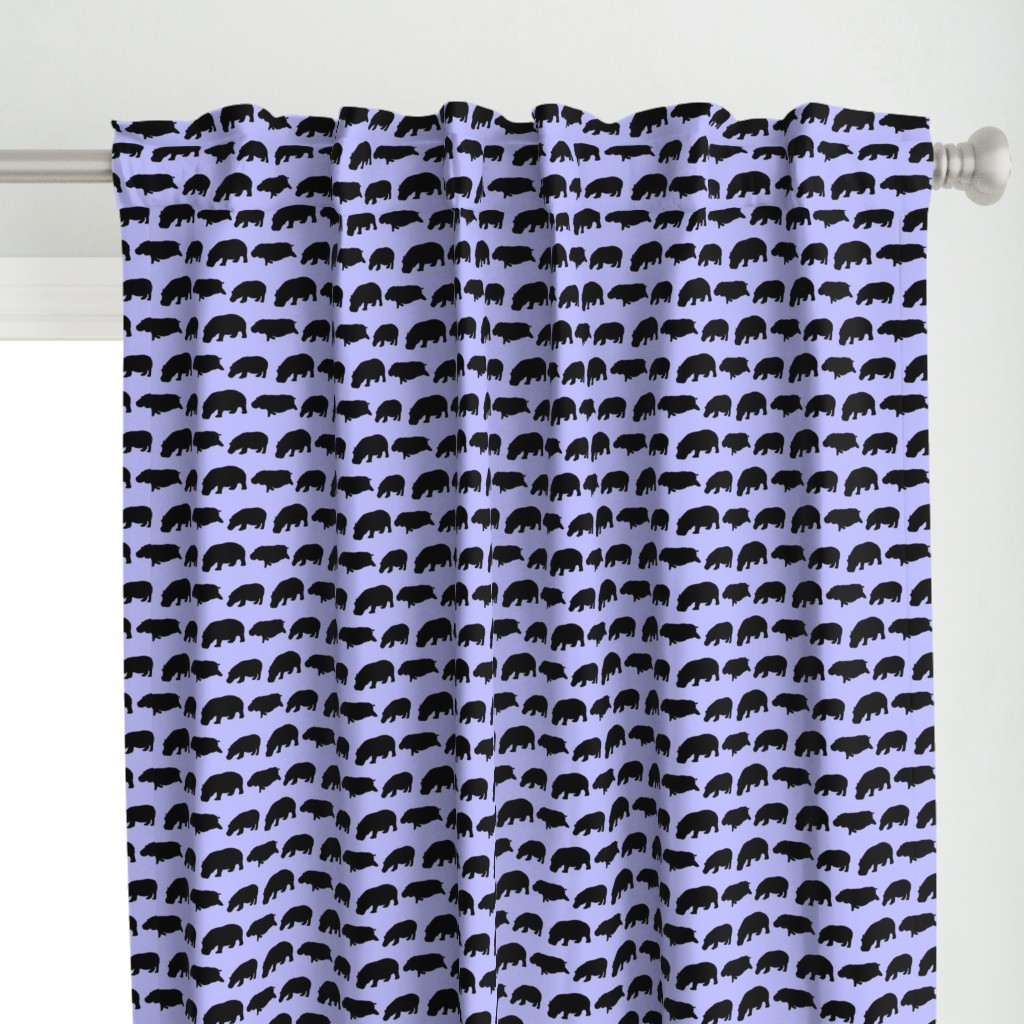 3 hippopotamus shadows in purple