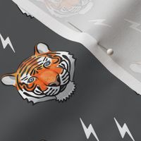 tigers on grey with bolts