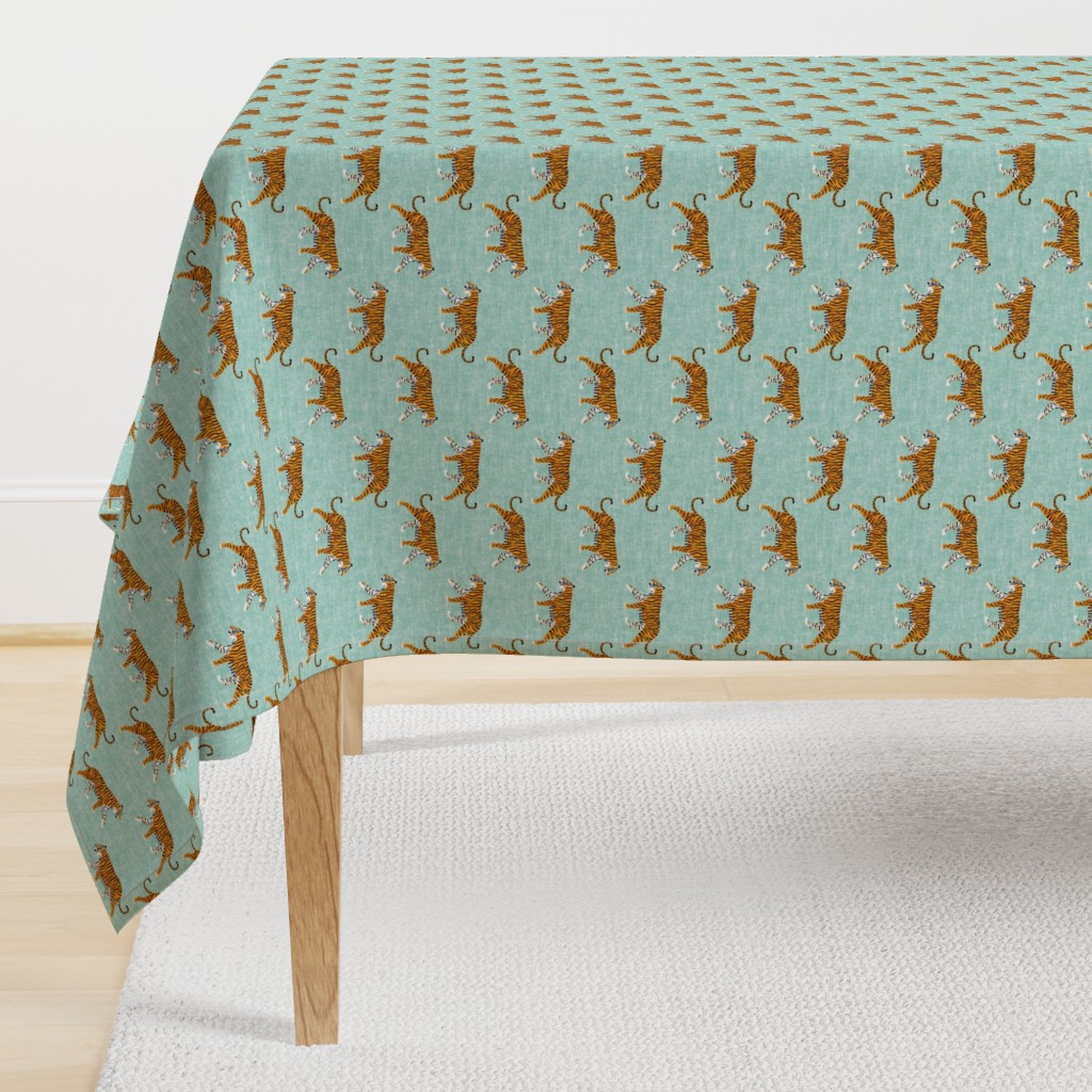 walking tiger on dark mint (woven)