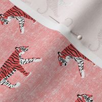 walking tiger on dark coral (woven)