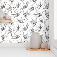 Origami paper cranes sketch black line on white background.