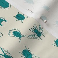 beetles in teal on natural (small scale)