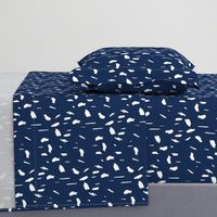 white paint dots on navy