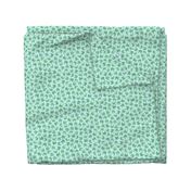 small serene frogs - green on light blue