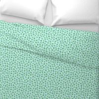 small serene frogs - green on light blue