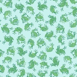 small serene frogs - green on light blue