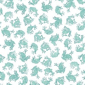 small teal frogs on white