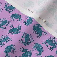 small mad teal frogs on lavender