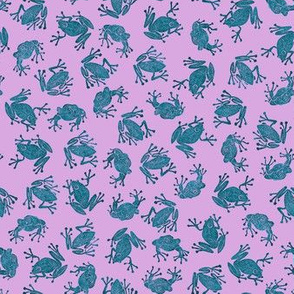small mad teal frogs on lavender