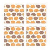 Small scale // Kawaii Mexican conchas // white background orange & brown shells