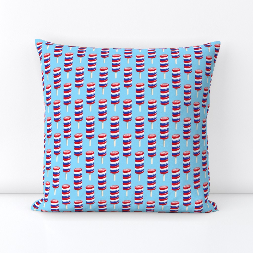 swirly popsicle on blue (red white and blue ice-cream)