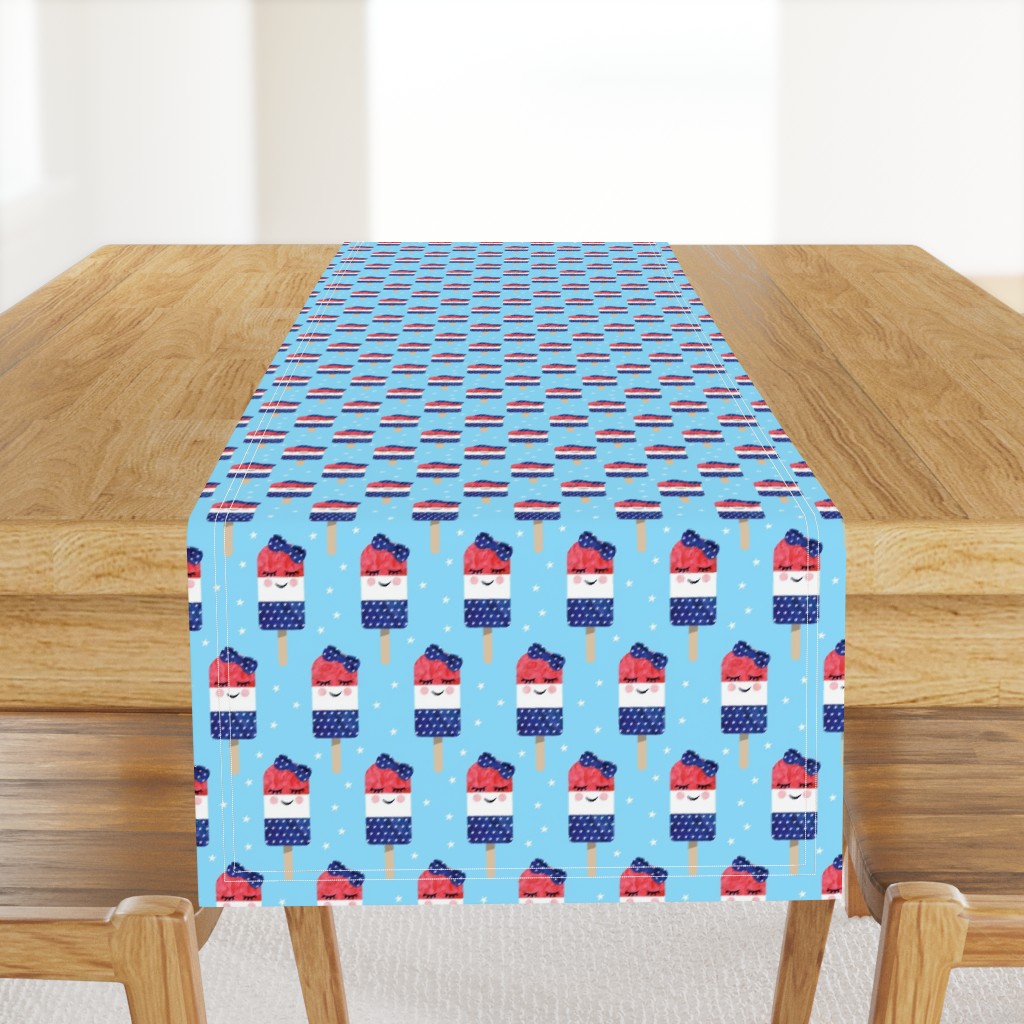 red white and blue popsicles - happy face - on blue 