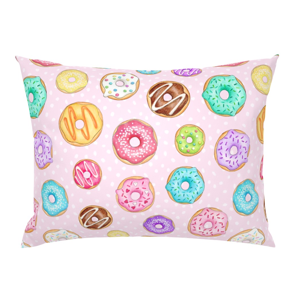 Scattered Rainbow Donuts on pale spotty pink - large scale