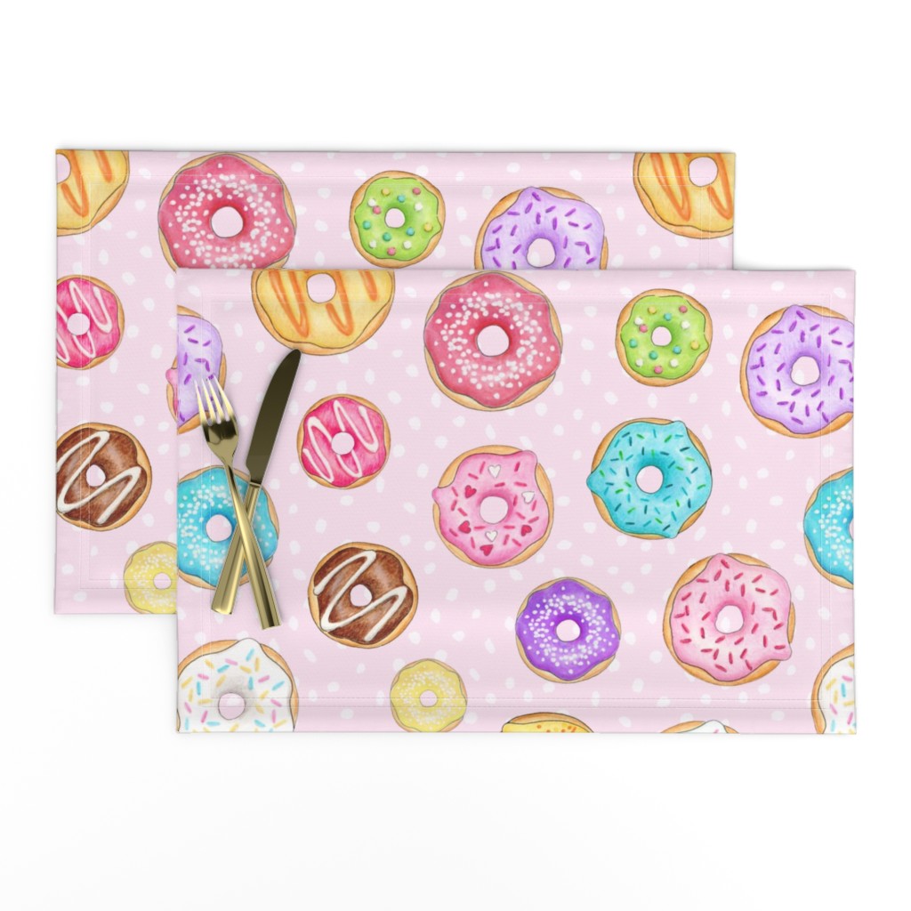 Scattered Rainbow Donuts on pale spotty pink - large scale