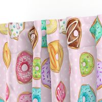 Scattered Rainbow Donuts on pale spotty pink - large scale