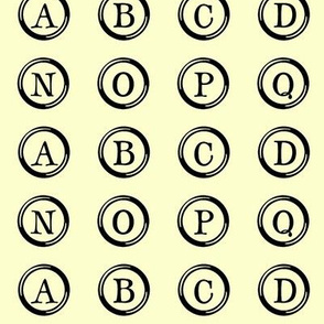 Typewriter Keys on Pale Yellow