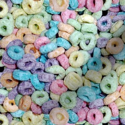 2 pastel fruit flavored breakfast cereal loops rings rainbow colorful food green purple blue red yellow seamless pop art 