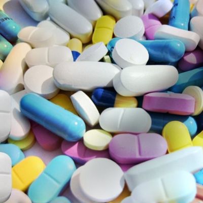 medicine medication pills tablets pop art rainbow colorful pink blue yellow purple white oval round oblong geometric shapes
