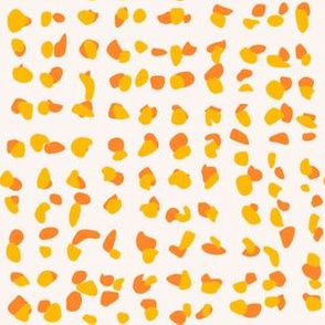 orange shapes on cream