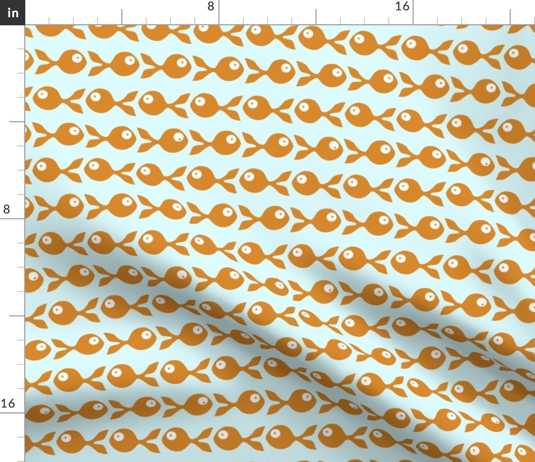 small - little fish swimming in orange on mint