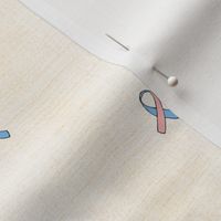 Pink and blue awareness ribbon on orange background