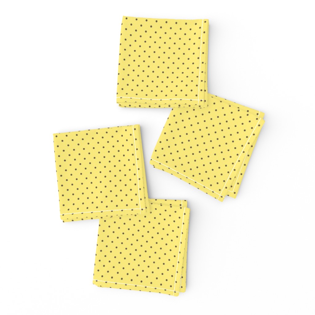 Tiny brown polka dots on yellow