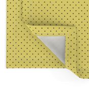 Tiny brown polka dots on yellow