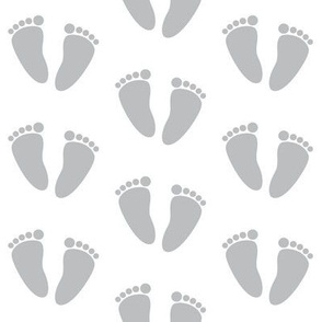 grey baby-feet on white