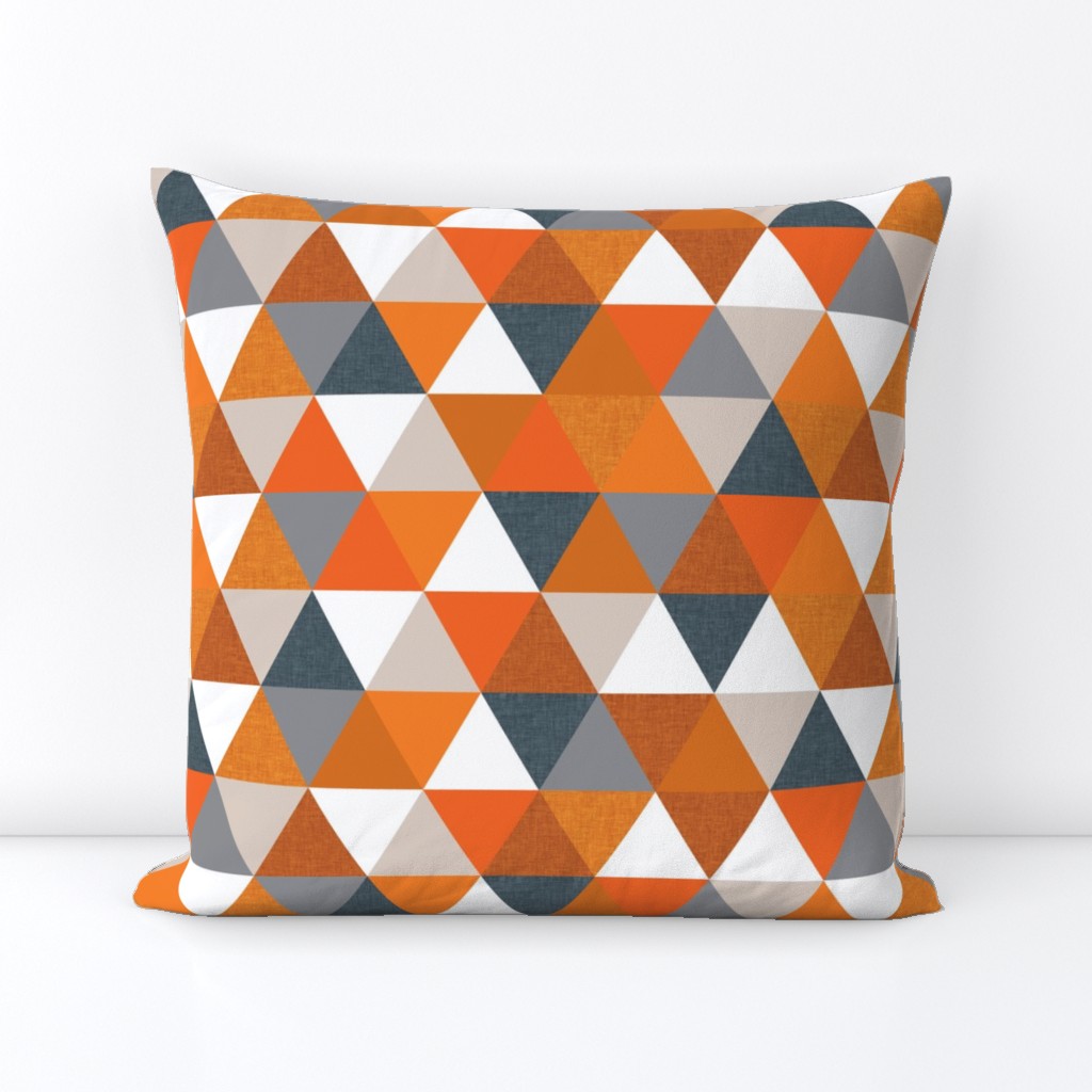 slate + orange triangles