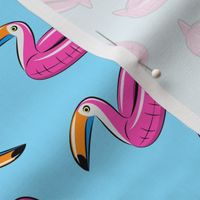 toucan pool float (pink on blue)