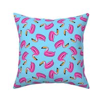 toucan pool float (pink on blue)