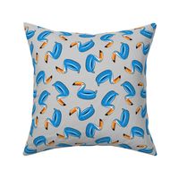 toucan pool float (blue on grey)