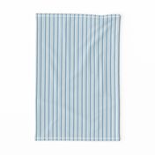 thin vertical blue and yellow stripes on textured light blue | small