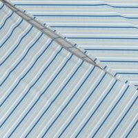 thin vertical blue and yellow stripes on textured light blue | small