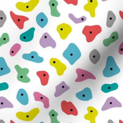 Colorful climbing and bouldering holds abstract grips shapes girls