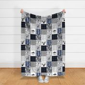The Woodsman Cheater Quilt Navy