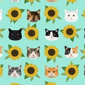 cat floral sunflowers cat heads fabric bright mint