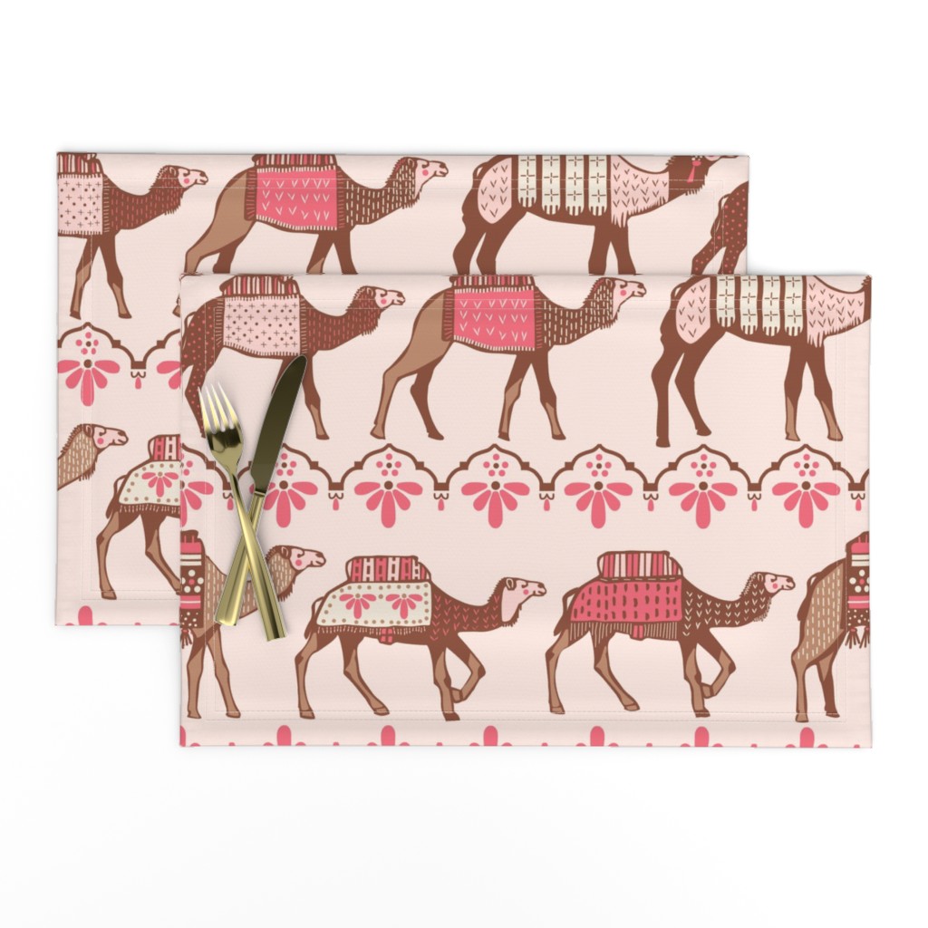 Marrakesh camels in a line pink and brown