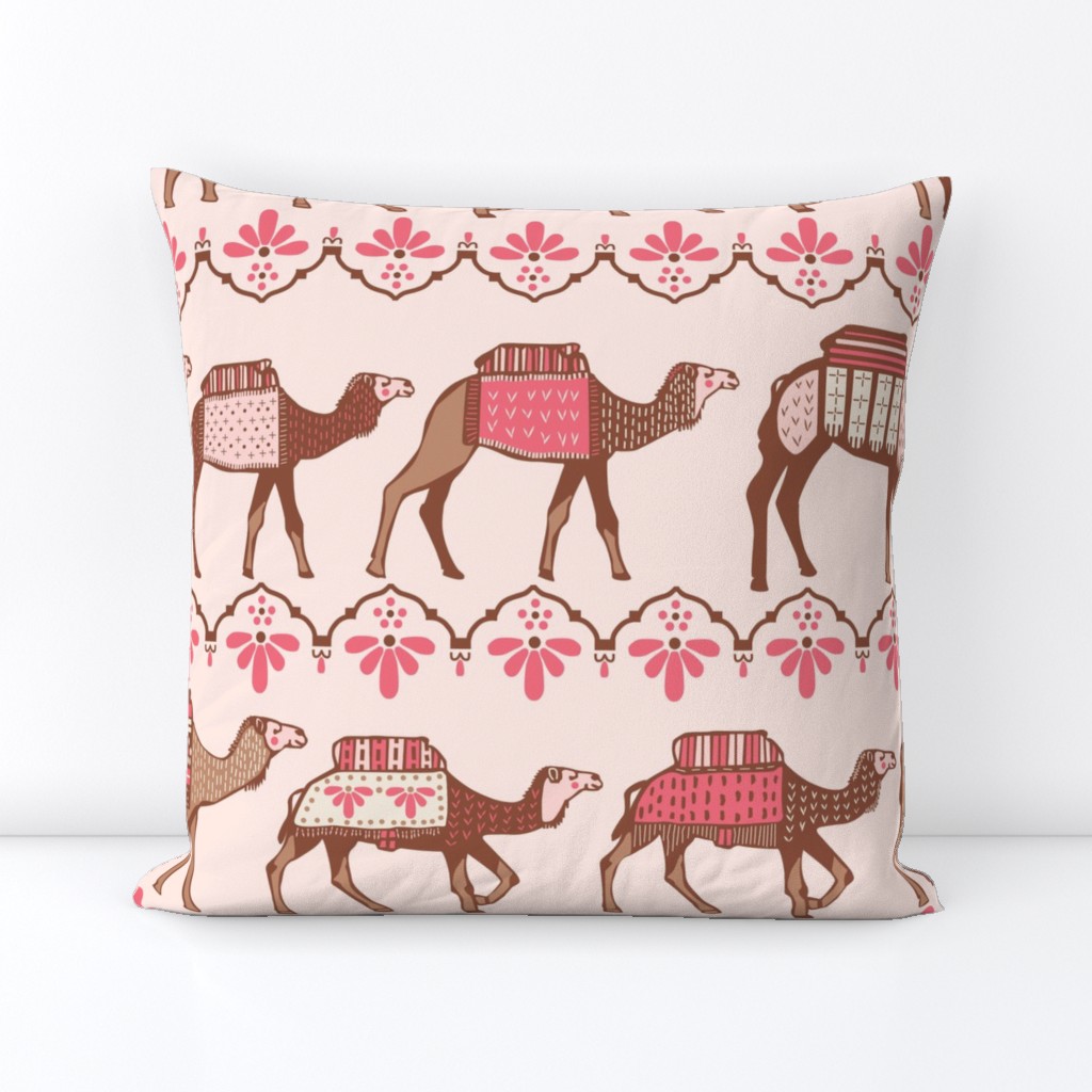 Marrakesh camels in a line pink and brown