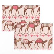 Marrakesh camels in a line pink and brown