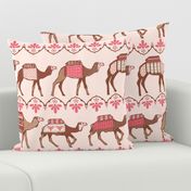 Marrakesh camels in a line pink and brown