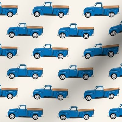 vintage blue truck on cream