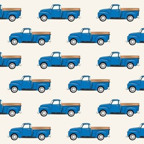 vintage blue truck on cream