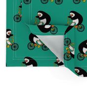 Penguins on bikes - Emerald