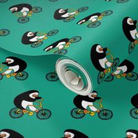 Penguins on bikes - Emerald