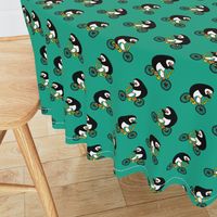 Penguins on bikes - Emerald